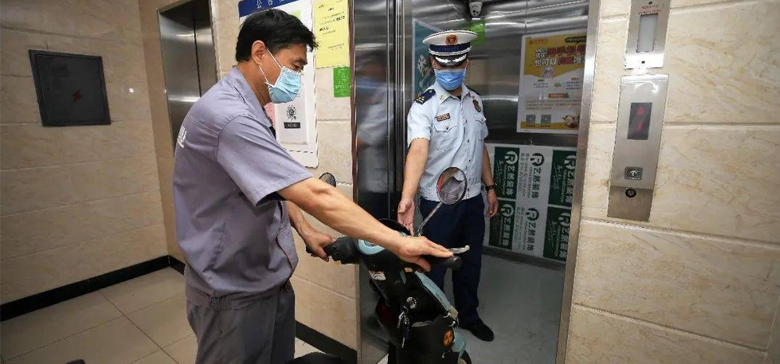 电动车榨取入电梯解决计划